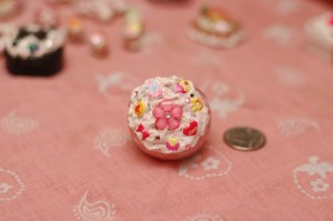 This is a pinkish clear container with a cute flower on the top and some stickers I got at the Japanese store. 