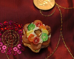 This is a "warm color" version of another cookie I have previously posted.  The little lemon broke before I had the chance to reinforce him. We have transported this cookie to the ER for surgery this afternoon. Feel free to leave him flowers so he can get better soon. :p