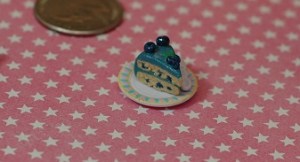 This little slice has a leaf sprig and some extra blueberries to be even more cute. 