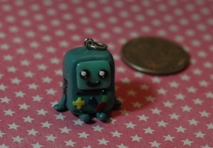 This little guy is from the show Adventure Time. I have never seen the show personally, but my boyfriend is a big fan and likes this character so I made a charm for him. It came out realllllly good, I am having a hard time letting him take the charm hehehe