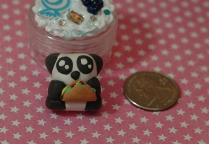 This is a panda bear holding a taco. I made it for a friend so I hope he likes it as much as I do! 
