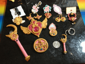 My favorite ones are the pentacles with gemstones in them and the big huge brooch with wings on it. The yellow little heart with wings was quite tricky to make. Everything else I have pretty much done enough times that I've got a system down. Hehe SOAD. 