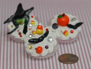 Here are the three Halloween containers I decoden'd. The golden snitch lookin' bats, pumpkins, candy corn, and wicked witch head were made by me. (You may recognize the witch and small candy corns from a prior post. Yay they finally got a home:) )