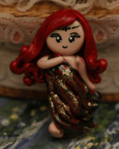 This one is mainly paint and glitter for the dress color, but I think it came out looking pretty neat.