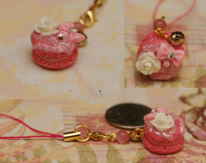 Here we have tiny pink macaron with some embellishments on the top. It's so cute, that I even put one on my cell phone (with the rest of the charm family :P) 