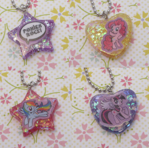 Just a few MLP necklaces. It is really difficult to fit stickers in these molds, but I can't find any others around this size that give a shine finish, most ice cube trays and candy molds in cute shapes leave the resin with a matte finish. 